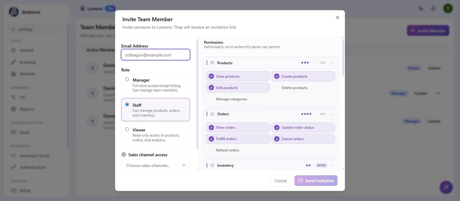 The Invite Team Member dialog showing the email field, role options, and the permissions panel