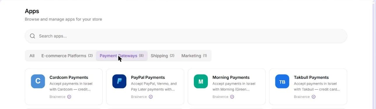 The Apps marketplace with the Payment Gateways category selected, showing the page title, the Search apps box, the category tabs (All, E-commerce Platforms, Payment Gateways, Shipping, Marketing) and the first row of payment gateway cards: Cardcom, PayPal, Morning and Takbull