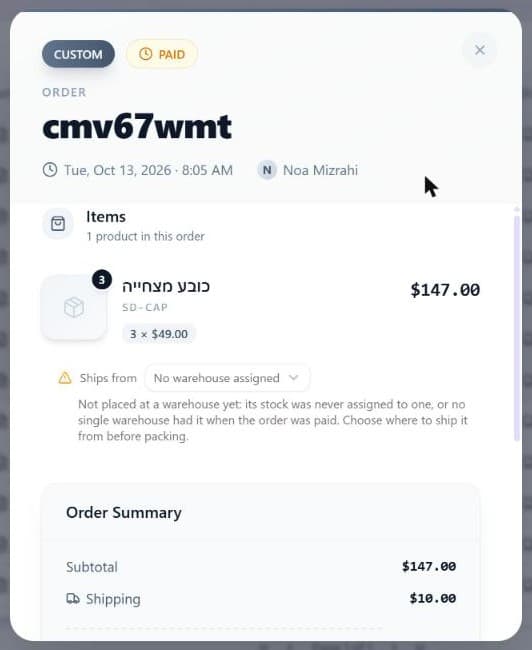 The Order Details window opened from the Items badge of a Paid order: the sales channel and Paid badges, the order number, date and customer name, the Items card with a product line and quantity badge, a Ships from dropdown reading "No warehouse assigned" with the note to choose where to ship it from before packing, and the start of the Order Summary card